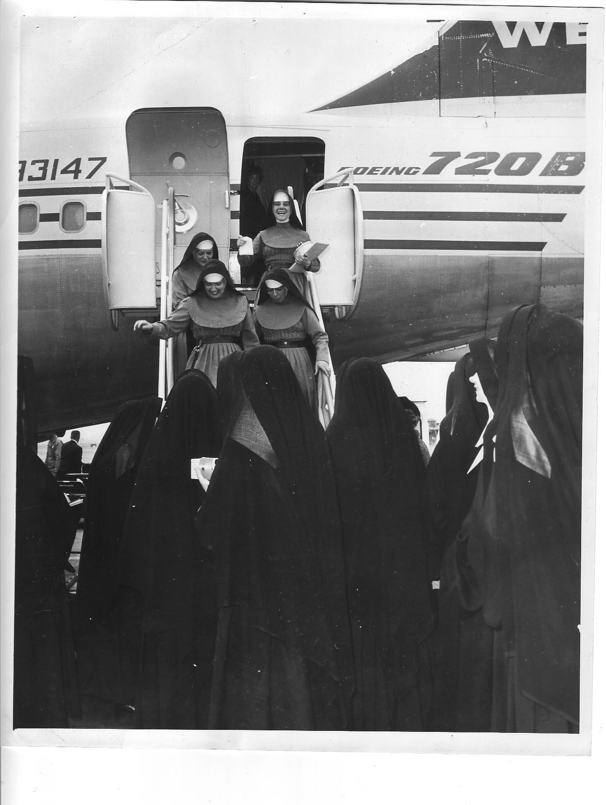 2 - Burlingame sisters depart