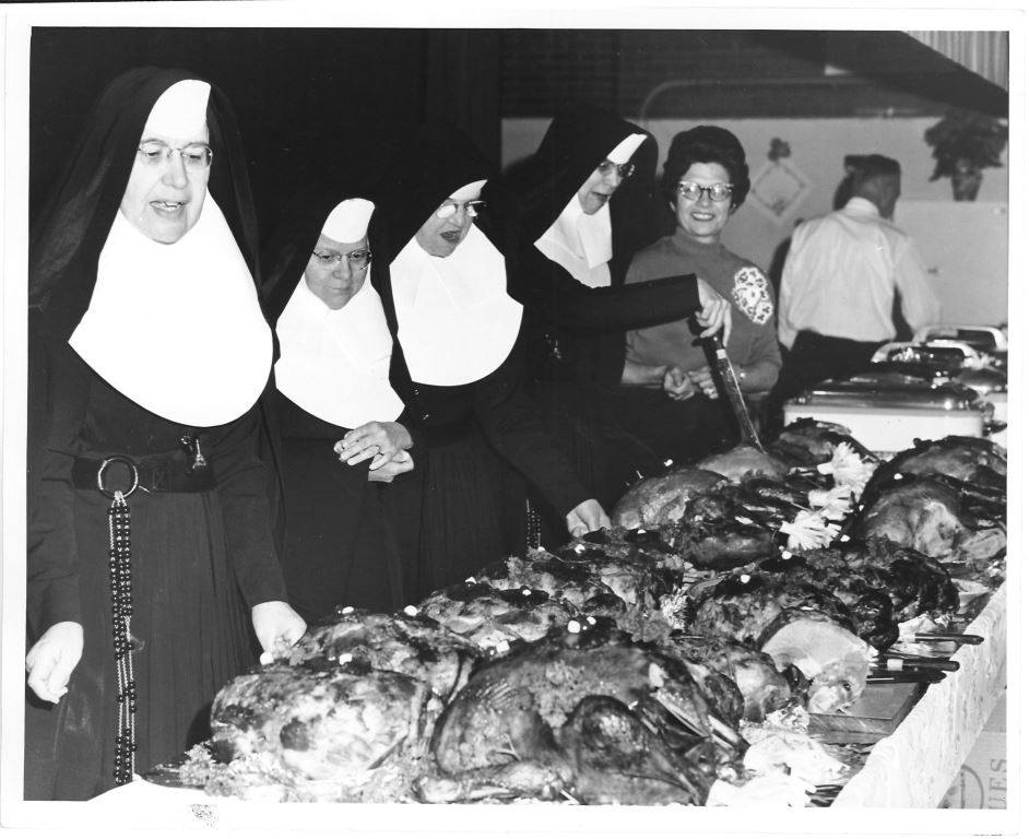 Charity and joy unite! Thanksgiving 1964—Sisters serve turkey at St. Michael’s Church in Pinconning, Michigan. Photo from Mercy Heritage Center.