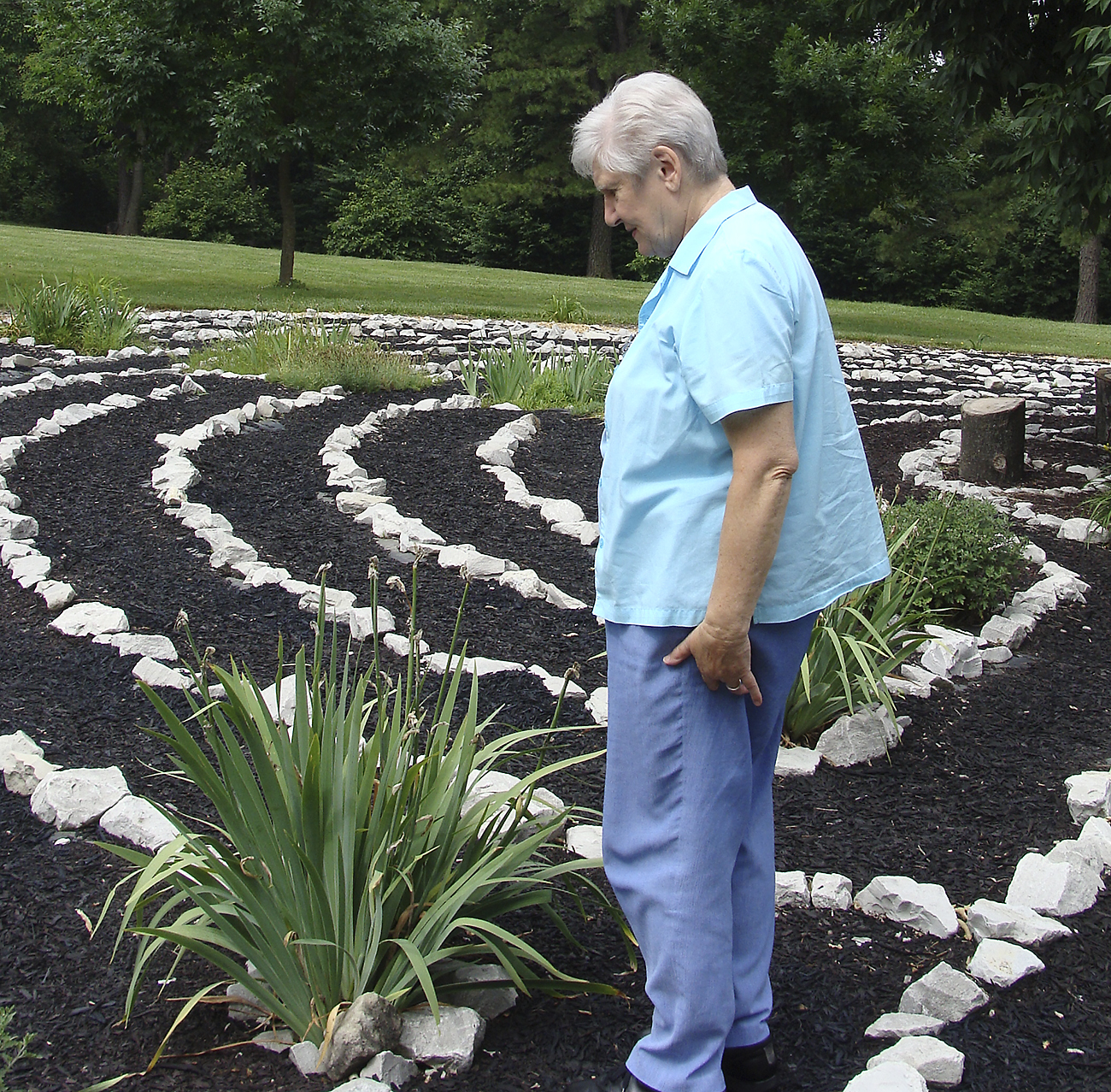 Sister Corlita Bonnarens walks the outdoor labyrinth at Mercy Center Campus in St. Louis, Missouri.