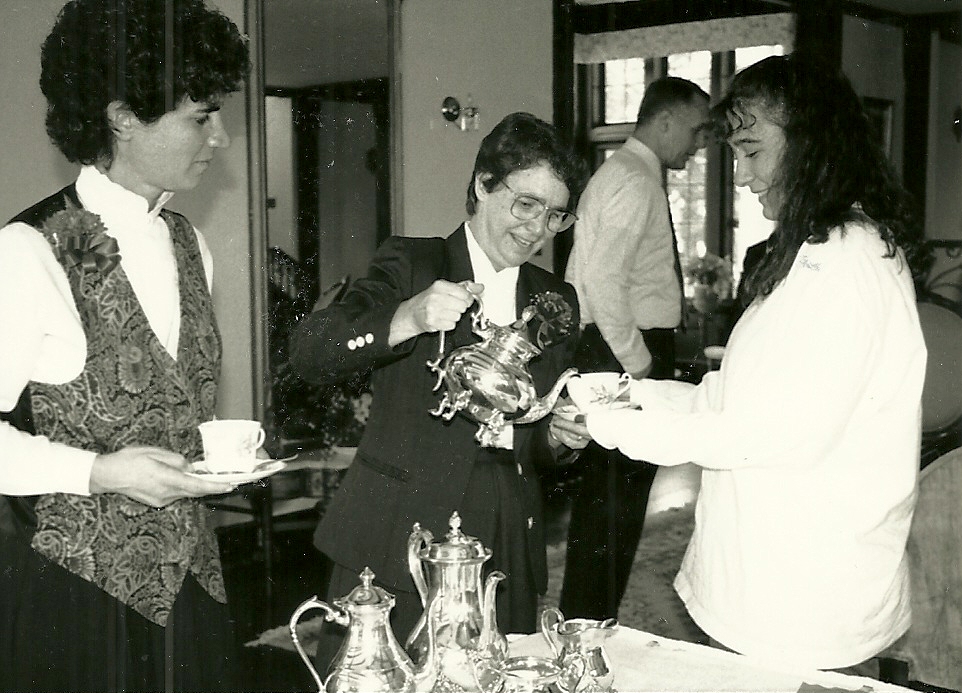 Sister Michele Aronica looks on as Sister Sylvia pours a cup of tea for a student on Mercy Day—September 24—in 1993. Credit: Saint Joseph’s College.