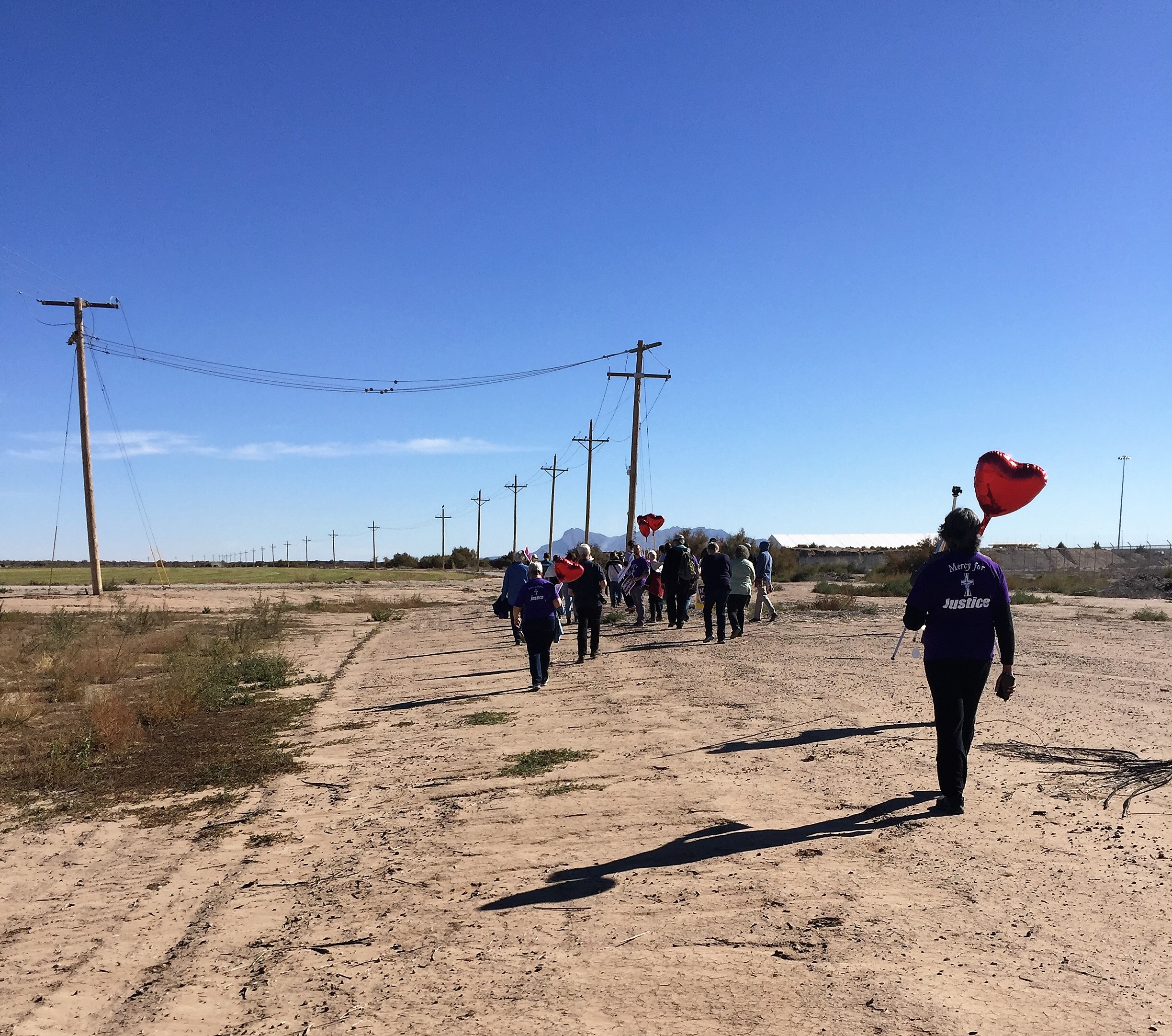 Members of our delegation with the red heart balloons