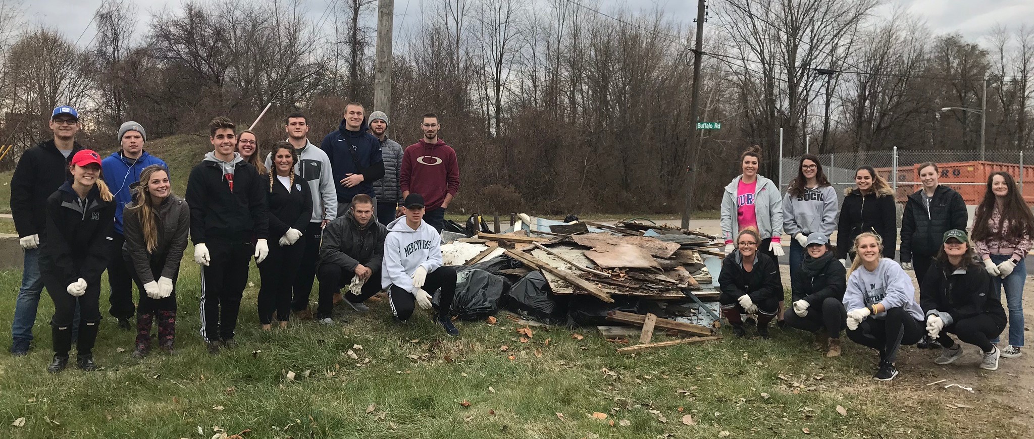 Students in the Environmental Problem Solving class at Mercyhurst University show off their illegal dumpsite cleanup. Pictured from left to right: Dominick Funari, Oran Horn, Cassandra Ellis (front row), Alicia McNulty (front row), Jimmy Szefler, Johanna Quinn, Georgia Capotis, Quinn Walsh, Daniel-Ramroth Finnegan, Bradley Novak (front row), Andrew Too-a-Foo (front row), Jordan Murray, Harison Laskey, Cameron Lewis, Hannah Rausch, Lia Velazquez-Hueck, Kali Carter, Elise Lashinsky, Julia Raymond (front row), Kelly Wagner (front row), Taylor Balser (front row), and Jessi Topping (front row).
