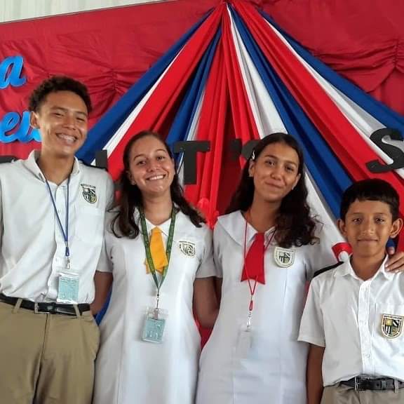 Students from each grade level spoke at the annual patriotic symposium held in September to celebrate the anniversary of Belize’s independence.