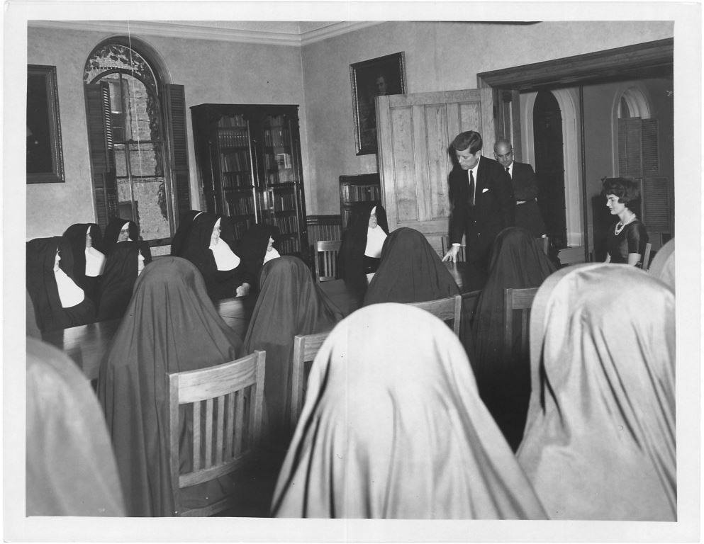 An image of John & Jacqueline Kennedy visiting sisters in the Motherhouse in New Hampshire.