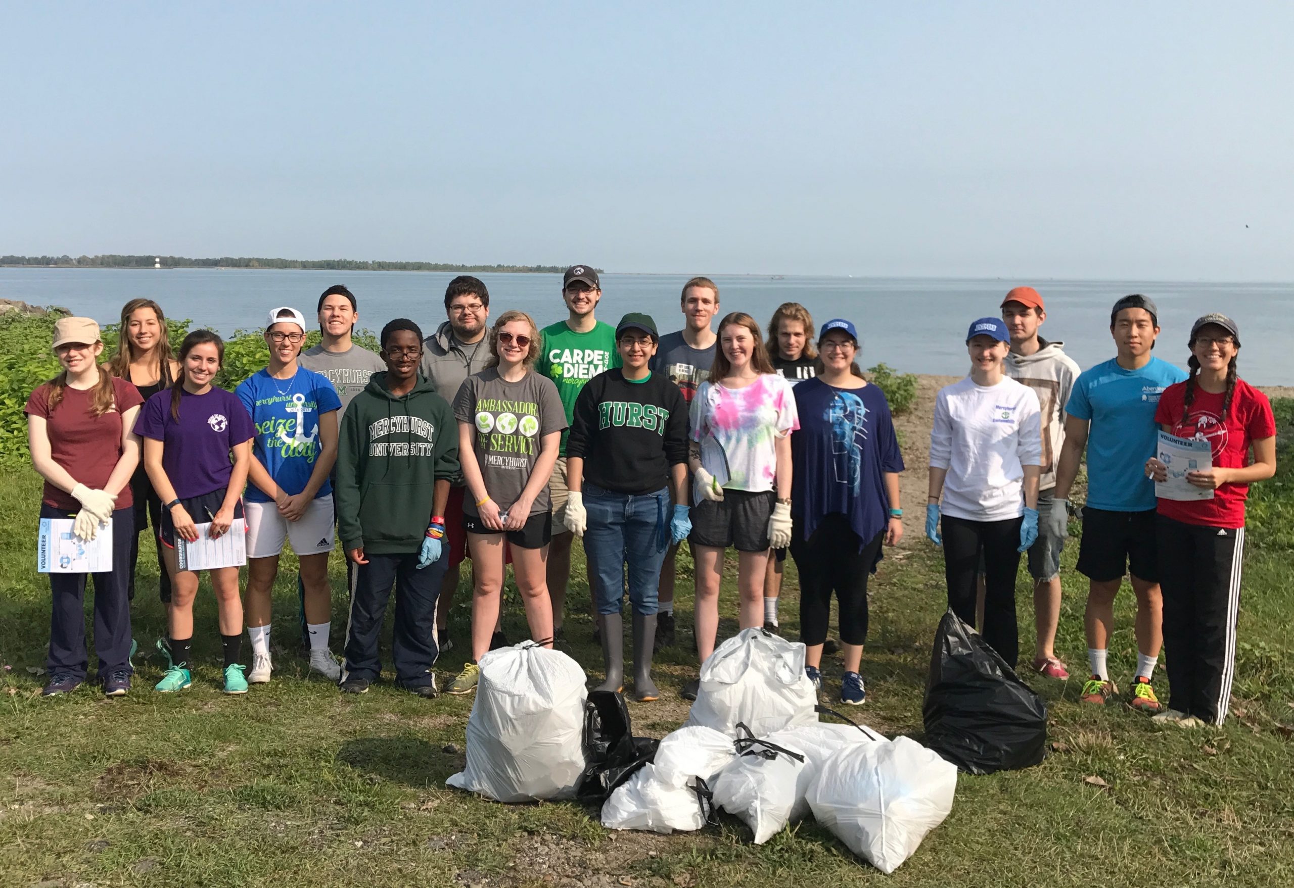 Student volunteers from Mercyhurst University with the garbage they cleaned up from the East Avenue Boat Launch in Erie, Pennsylvania, during International Coastal Cleanup. Pictured from left to right: Carly La Riviere, Katie Reisinger, Emily Morabeto, Odie Enslen, Cole Prots, Collin Davis, Steven Martz, Meghan Maker, Christian Copper, Ashley Espinoza, Logan Floyd, Marina Boyle, Paul Cohen, Michelle Benedetti, Jenna Uhlig, Jordan Sigmond, Jason Huang, and Angelea Belfiore.